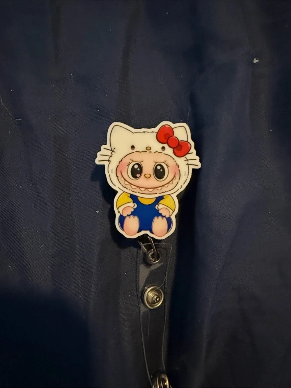 Cute White Character Badge Reel with Blue Outfit